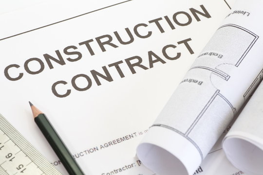 Construction contract and building plans used in a building dispute review