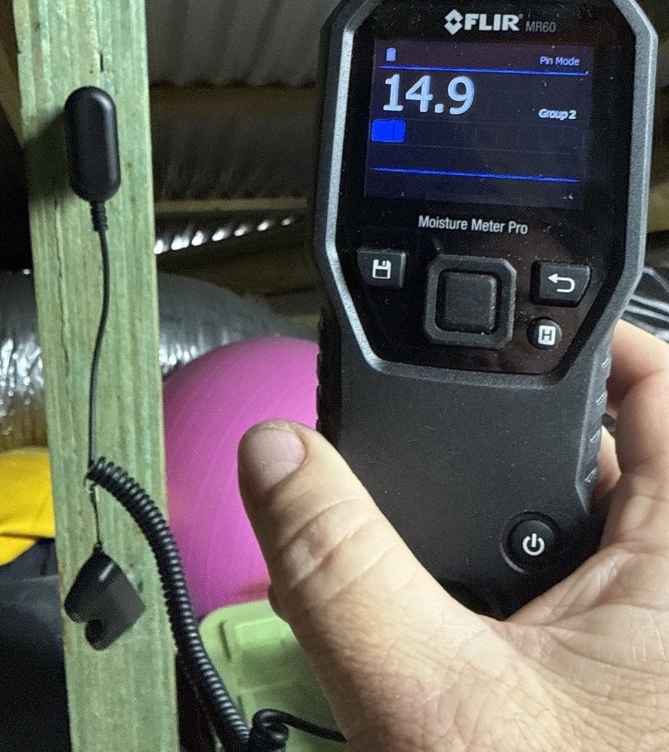 Moisture meter used during building investigation